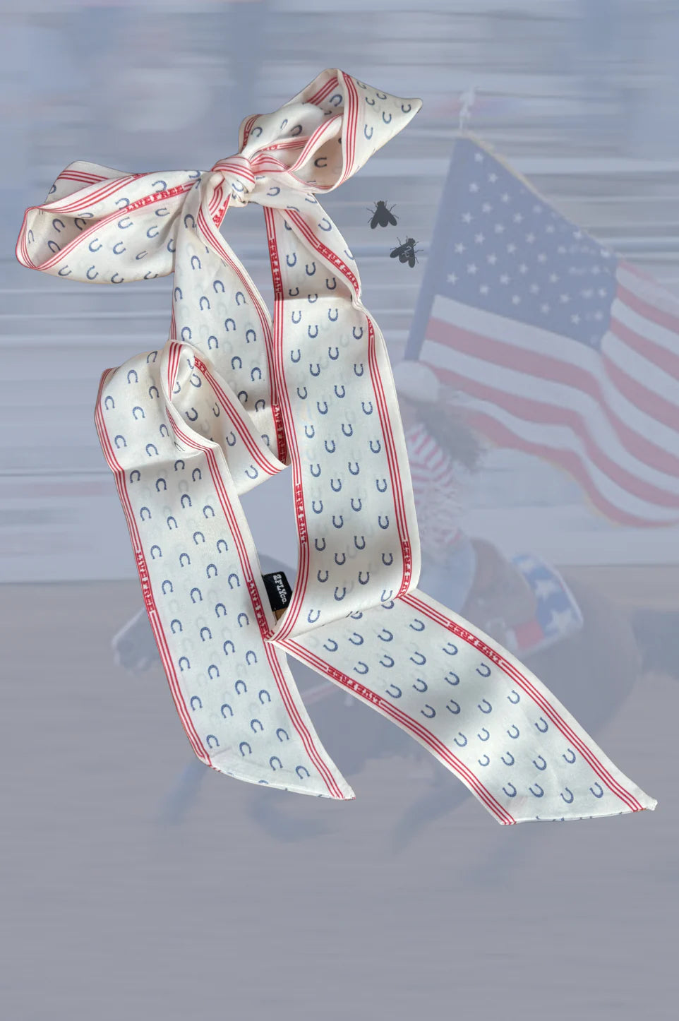 Decorative bow with red and blue pattern on a blurred background