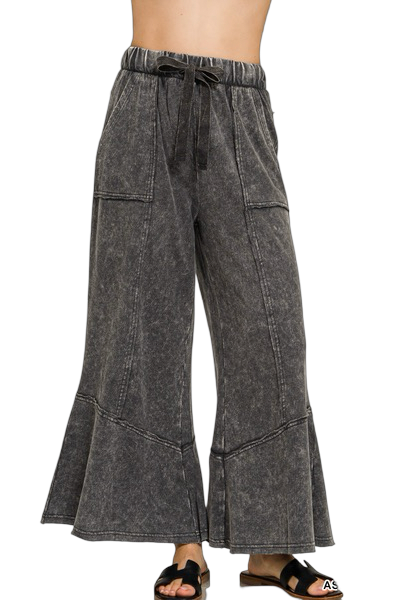 Black wide-leg pants with drawstring waist on a white background