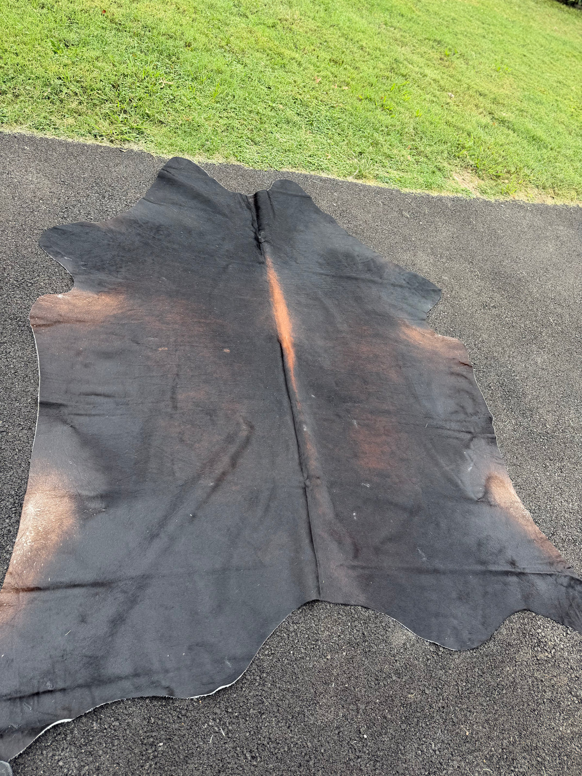 Dark brindle cowhide rug