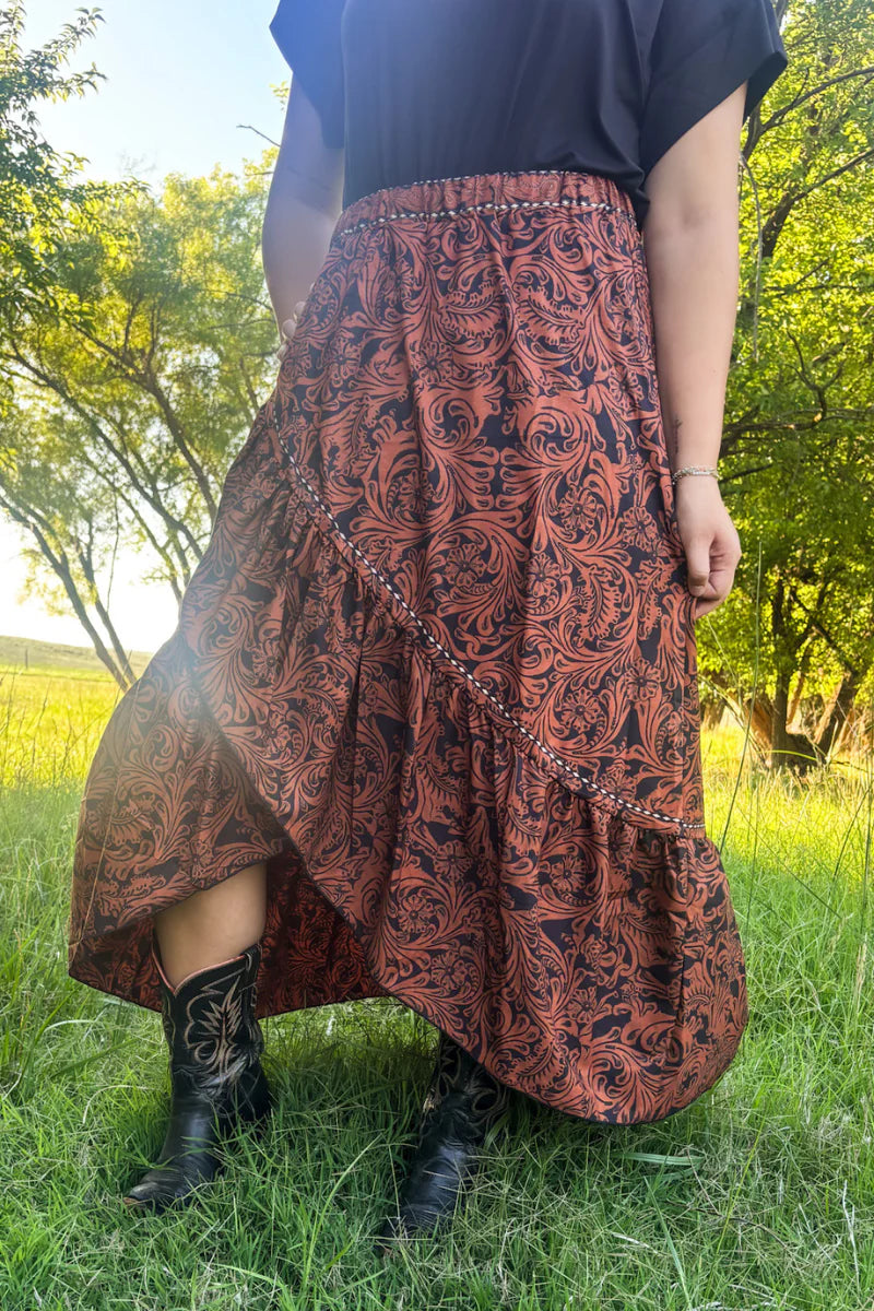 Brown flows skirt with floral black patterns 