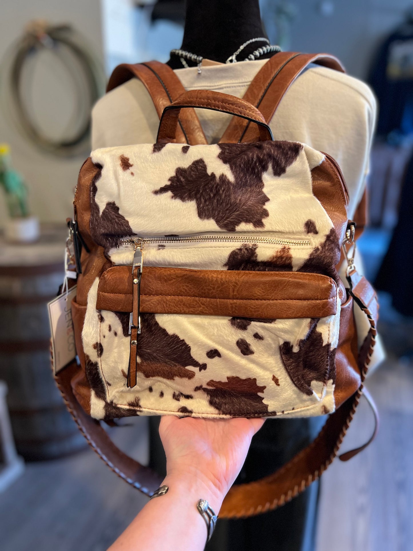 The Amelia Cow Backpack Crossbody