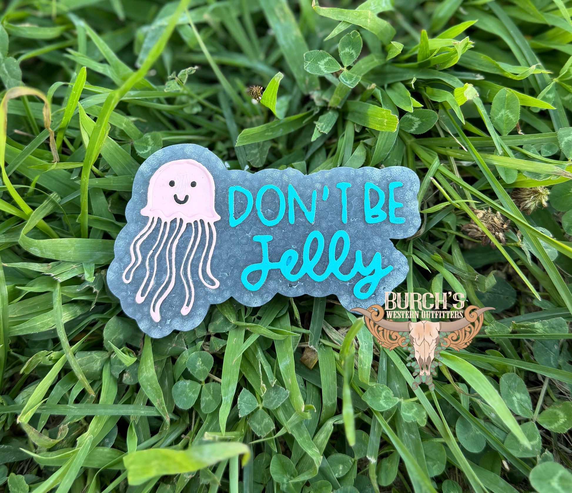 Freshie with jellyfish design and text 'Don't Be Jelly' on grass