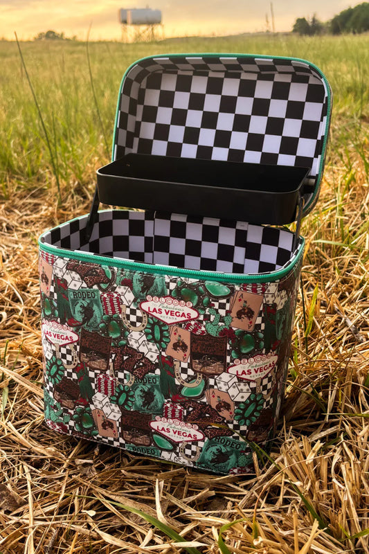Patterned bag with checkered interior on a grassy field